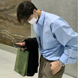 Ceekoo  -  Korean Fashion Men High-end Light Blue Shirt Men Summer Solid Color Simple Casual Loose Button Pocket Long sleeve Shirts for Men